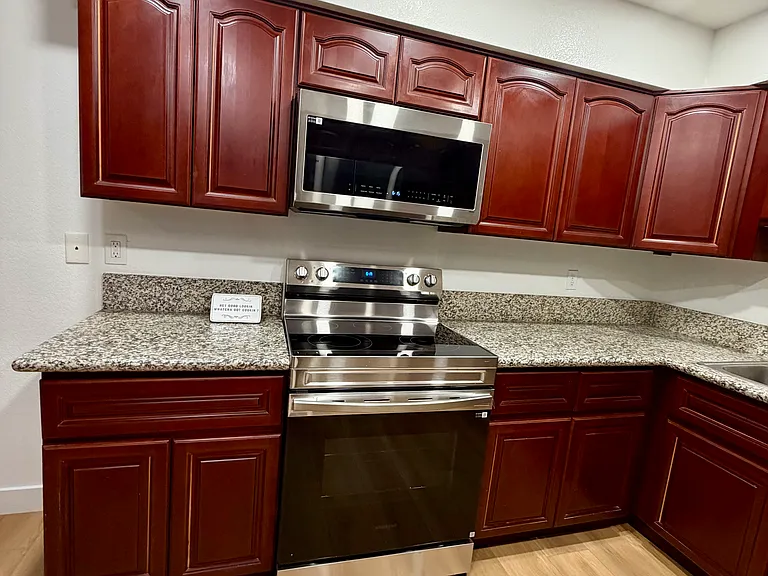 Additional kitchen view highlighting stylish finishes and ample workspace