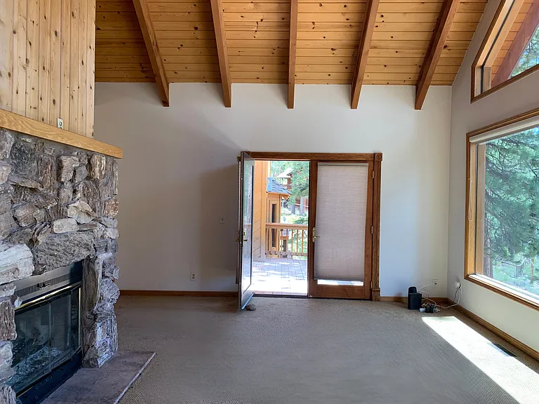 Living room with access to middle deck