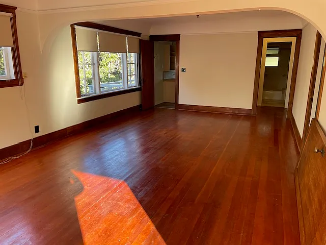 Lovely large living and dininjg room with hardwood floors.

Apartment has been freshly painted throughout.