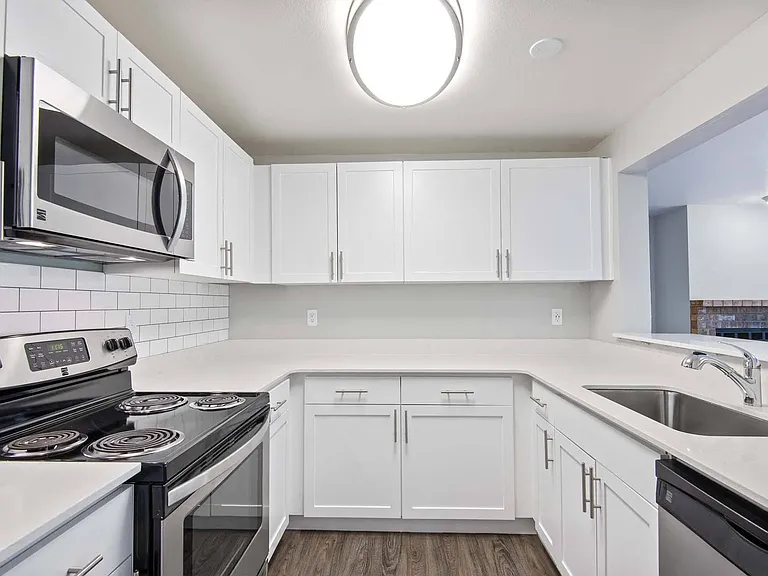 Enjoy a kitchen designed for both efficiency and elegance, with ample counter space and state-of-the-art appliances.