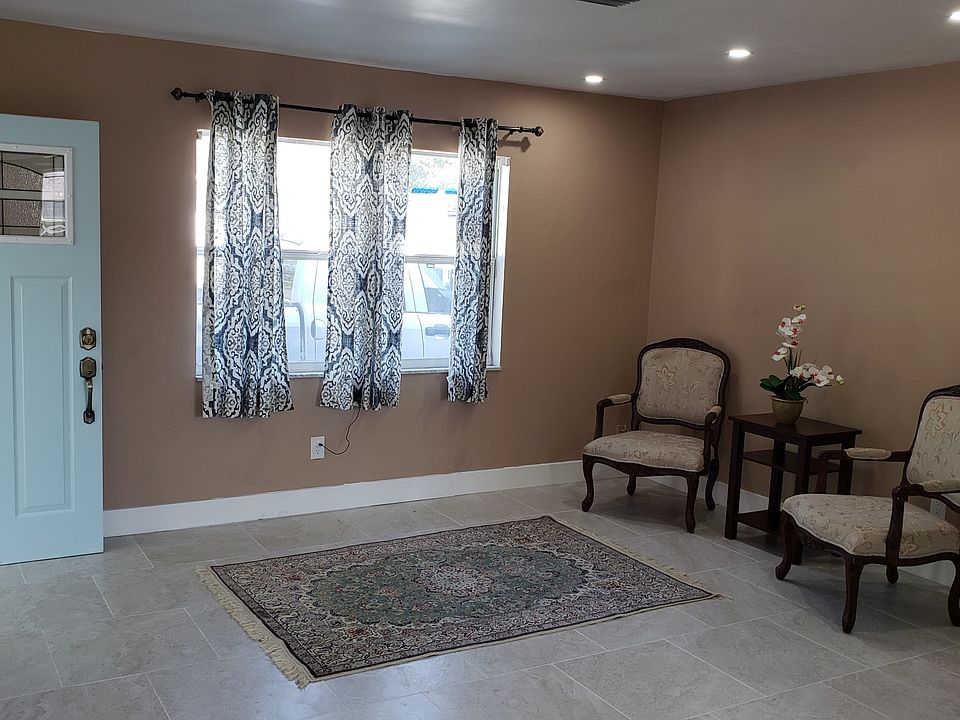 View of Living Room Area from Dining Area.