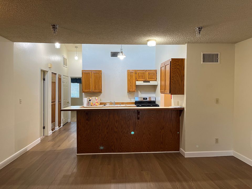 Living room facing kitchen