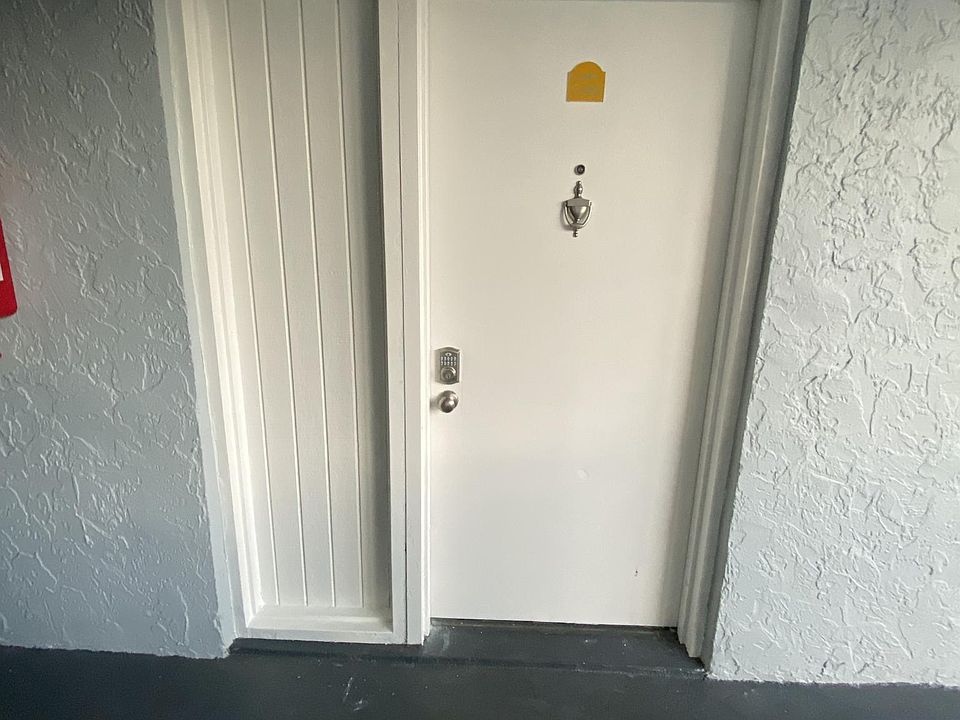 Front door with keypad entry lock