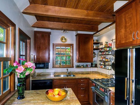 Kitchen with granite countertops and Wolf range