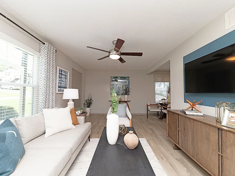 Spacious living room with hardwood-style flooring