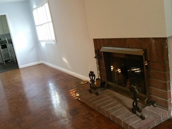 Living Room With Decorative Fireplace