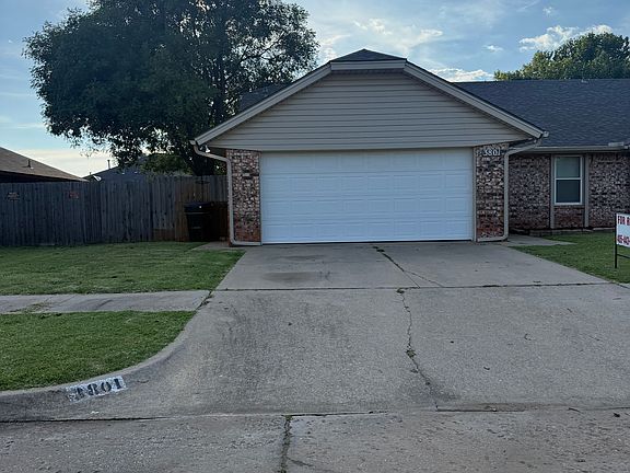 2 car garage with fenced yard