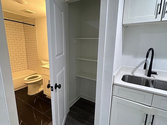 5th image of 321 E 8th St APT 107