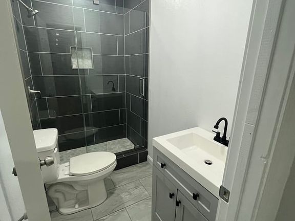 Bathroom with stand up shower
