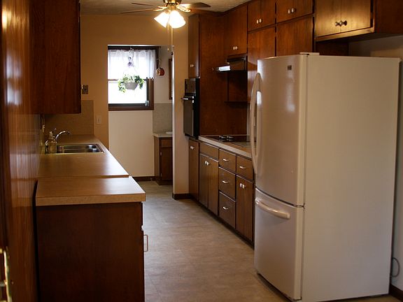 Kitchen looking into laundry