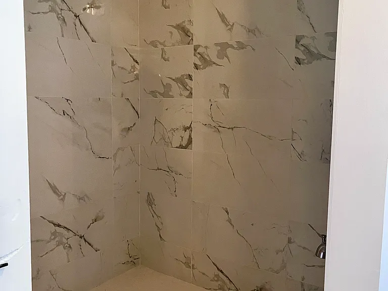 Walk-in marble shower