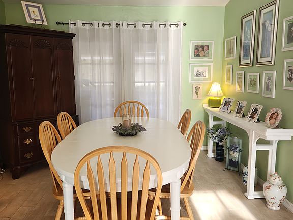Formal Dining Room facing Lanai & Pool