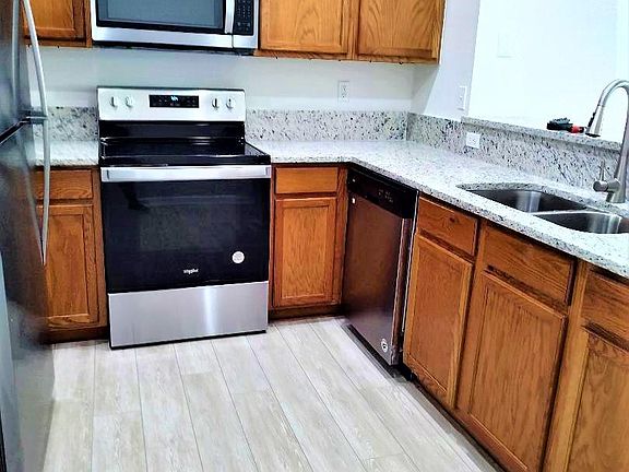 Kitchen view 2, ALL new granite, appliances, fixtures, lighting