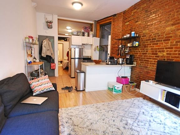 2nd image of 67 E 2nd St APT 12A