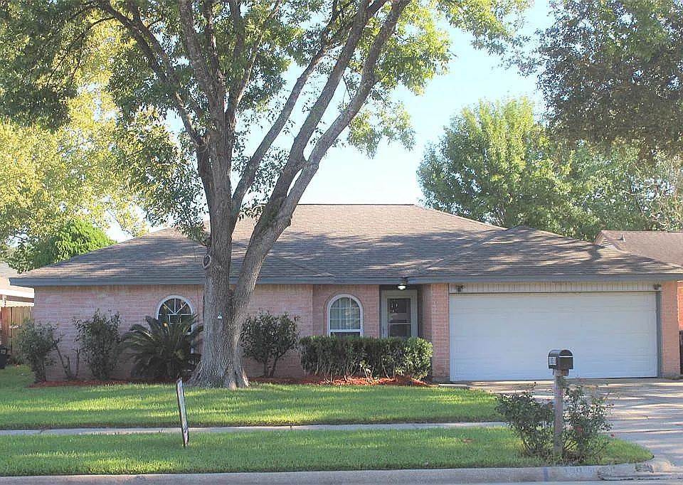 Front of the house. There is plenty of shade.