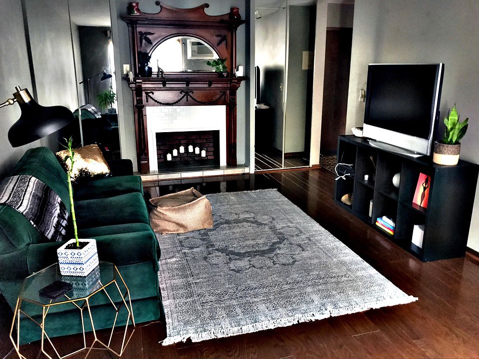Living room with charming faux fireplace