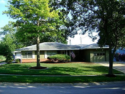 front view of home looking from Street (NW Michael)