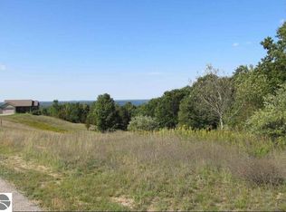 7632 Saddle Horn Dr, Grawn, MI 49637
