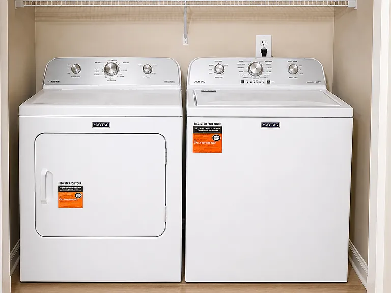 Washer & Dryer in laundry closet on ground floor.