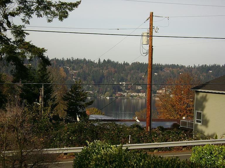 view of lake wa from large deck off fam rm