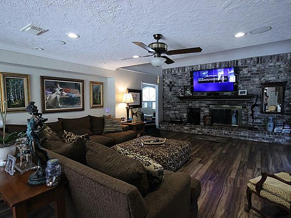 To understand the scale of this room, that TV is 70".  It's big!