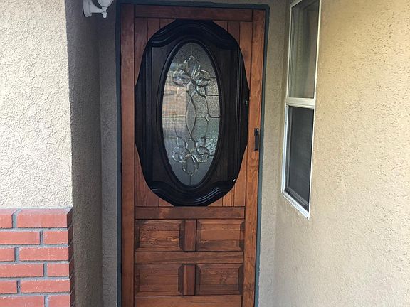 Front door with wood screen door