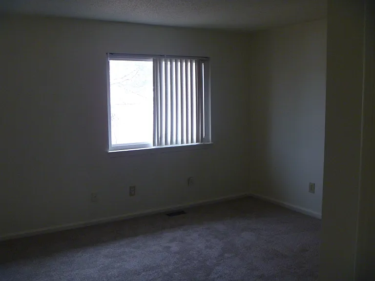 Upstairs bedroom facing yard.