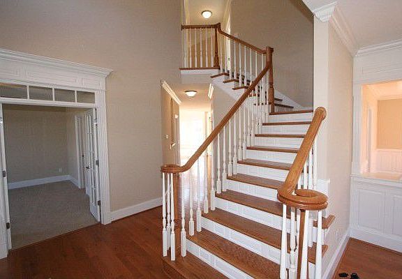 Beautiful hardwood and craftsman detailed steps