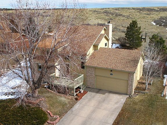 Half-Acre Lot Backs to Colorado Golf Club Open Space!