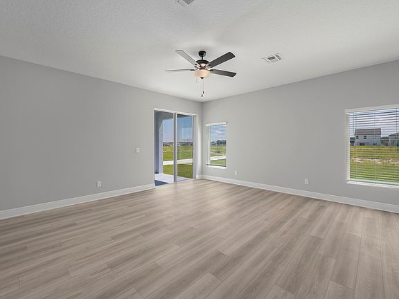 This family room opens to covered patio.