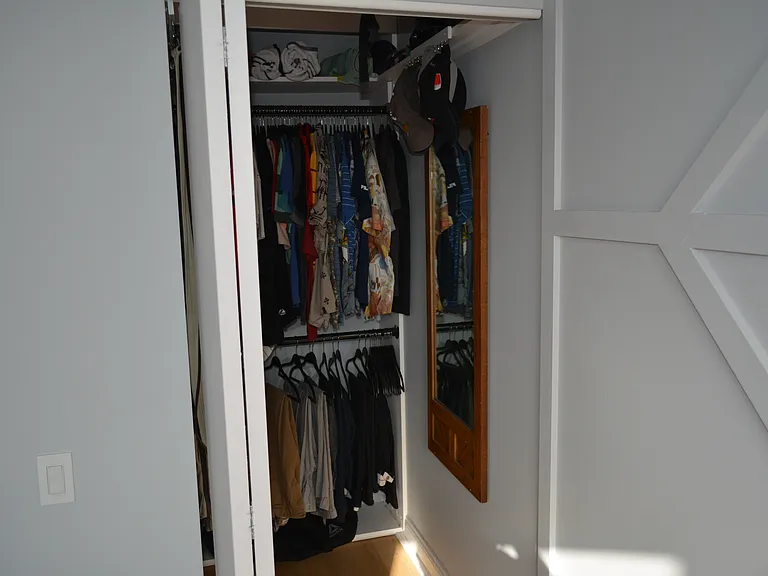 Custom walk-in closet connected to the bedroom