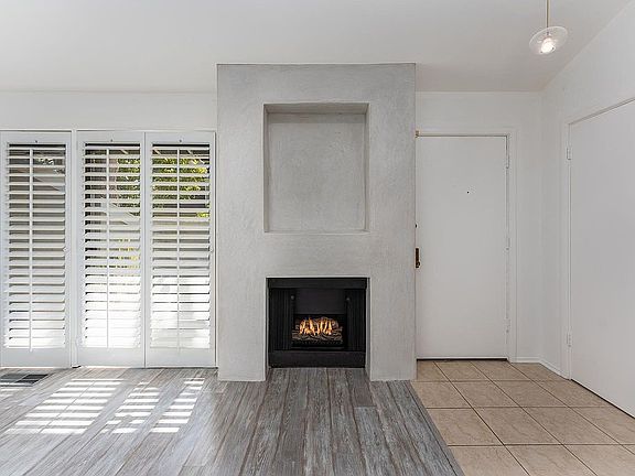 Warm sunlit room, and a fireplace with a flick of a switch.