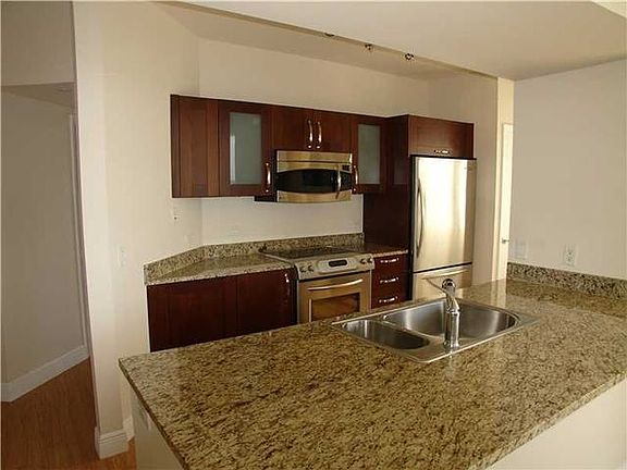 3rd image of 19900 E Country Club Dr APT 1210