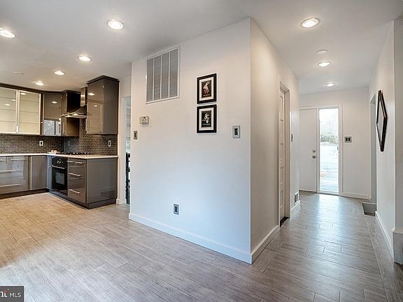 New Contemporary Tile in Kitchen and Foyer