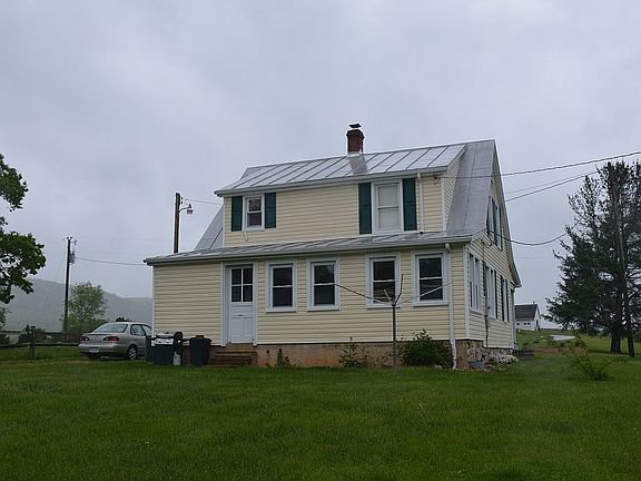 Rear - back sun room