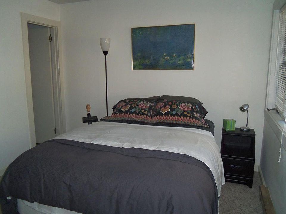 Queen sized bed with down duvet.