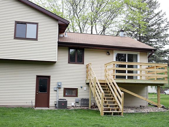 New sliding glass doors walk out to your private deck and large back yard