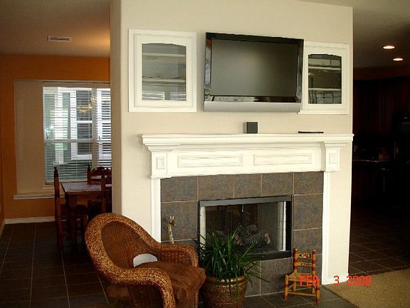 See through fireplace and media with surround sound built  in the ceiling