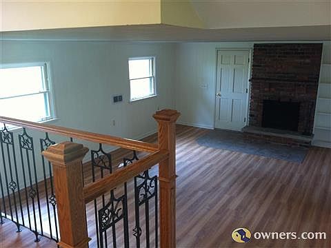 Kitchen looking down to Family Room/fireplace