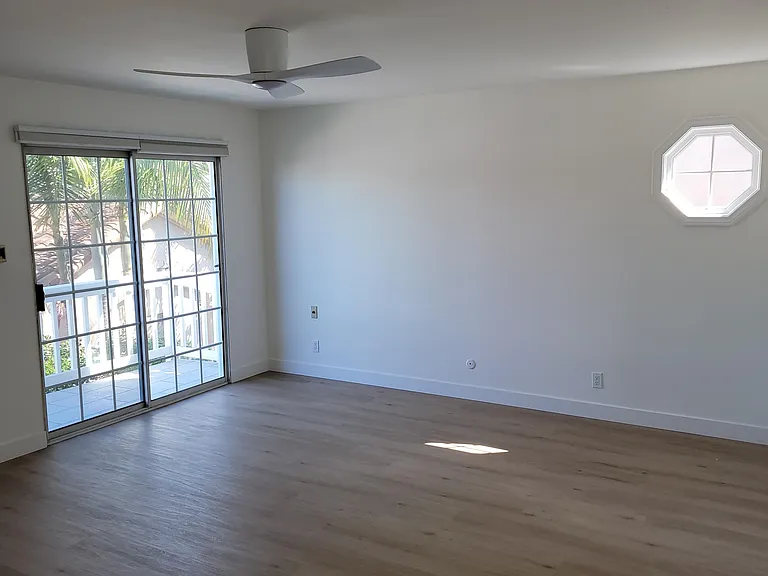 Master bedroom with balcony.
