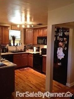 Kitchen
						:
						Newly renovated, appliances still under warranty