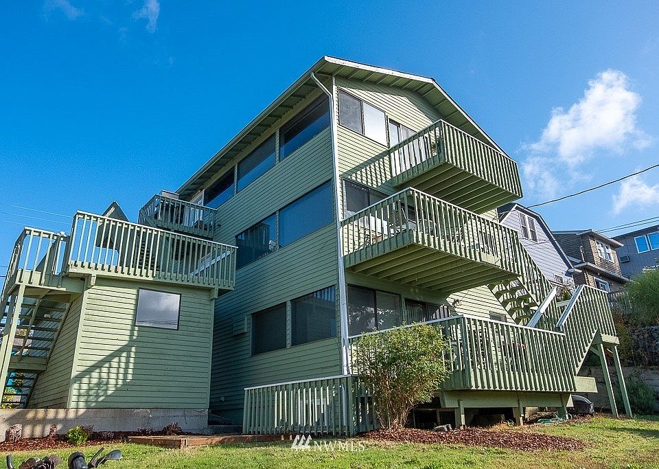 Exterior spaces including shared backyard and private balcony