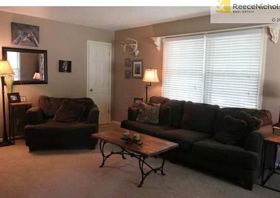 Warm & Inviting Living Room Welcomes Guests