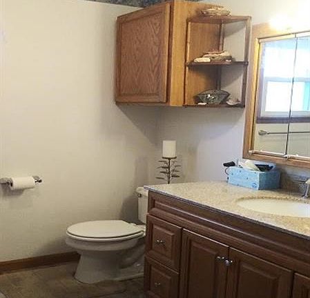 Master Bathroom with granite counter tops and new ceramic floors.