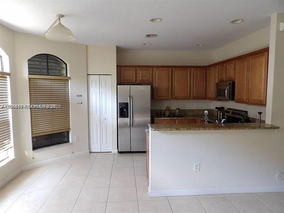 1st image of 10315 NW 30th Ter #Townhouse 10315
