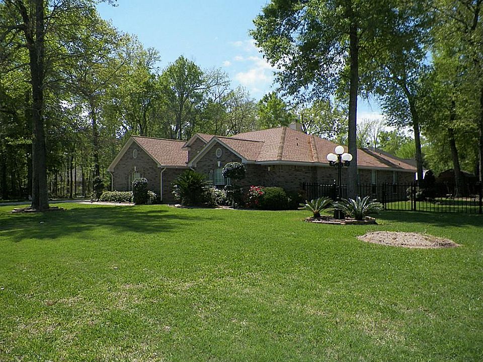 Look at the room with this home on two lots.