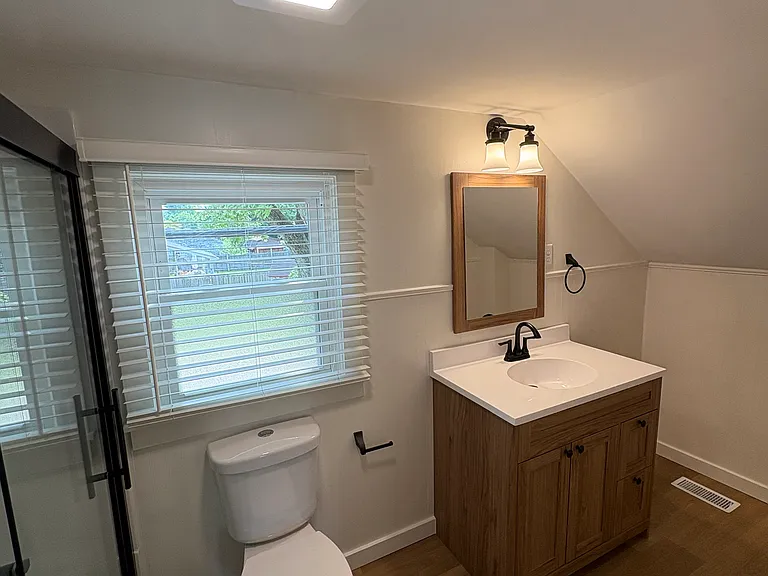 Full Bath with walk in shower off the bedroom upstairs
