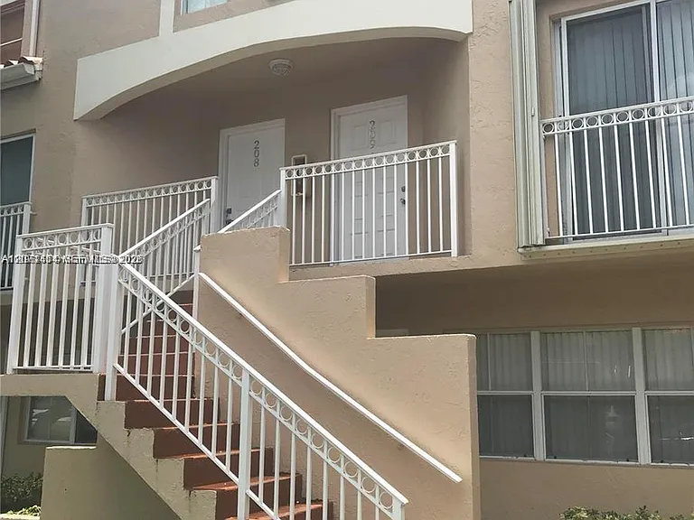 8670 NW 6th Ln #4-208 — Photo 1