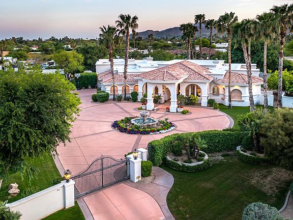 Privately gated mansion at end of cut-de-sac.