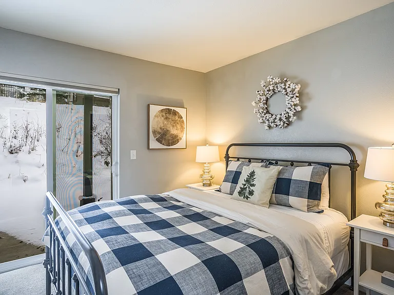 Bedroom 3: Queen bed. Ensuite bathroom. Walk out to backyard.
